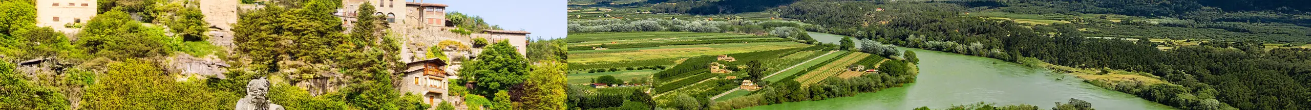 Vista de un entorno rural con paisaje verde y arquitectura tradicional en Cáceres, representando el desarrollo sostenible y tecnológico.